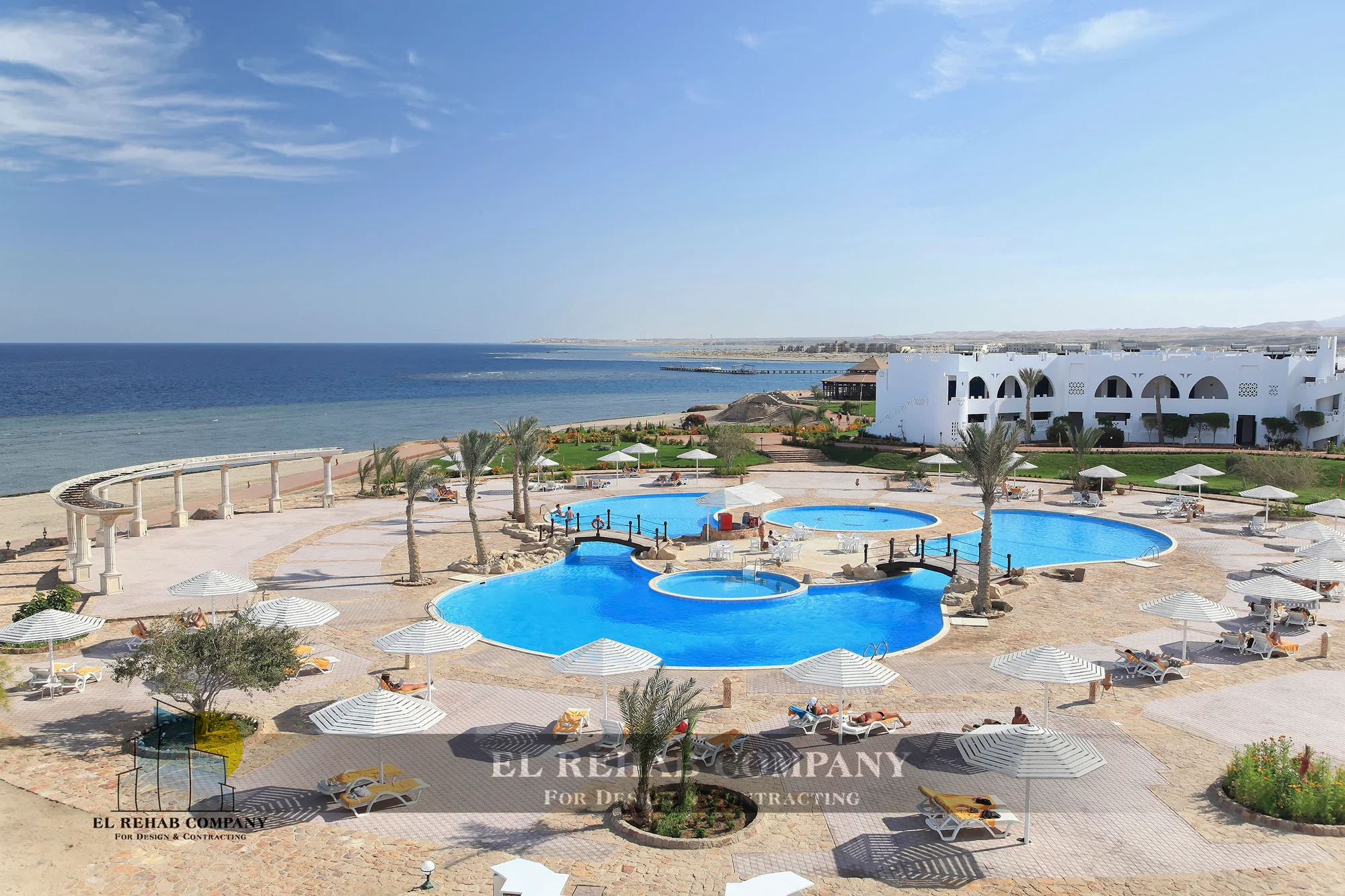 Completed Equinox Village pool and landscaped grounds beside the Red Sea
