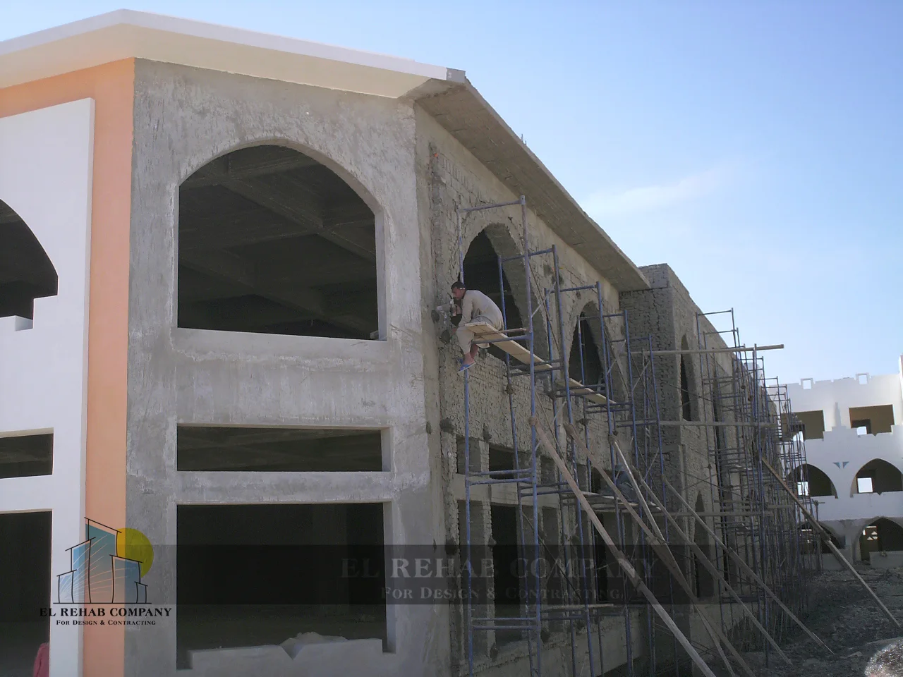 Main building facade during construction